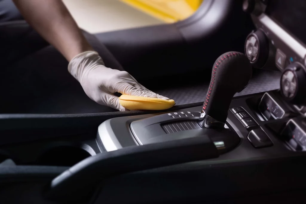 car interior detailing by a human hand