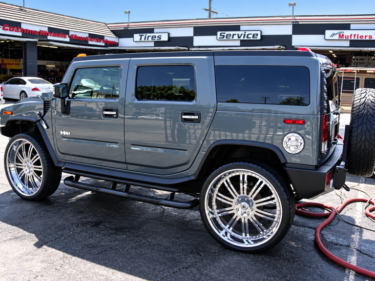 Gray Hummer H2 at Auto Service Shop