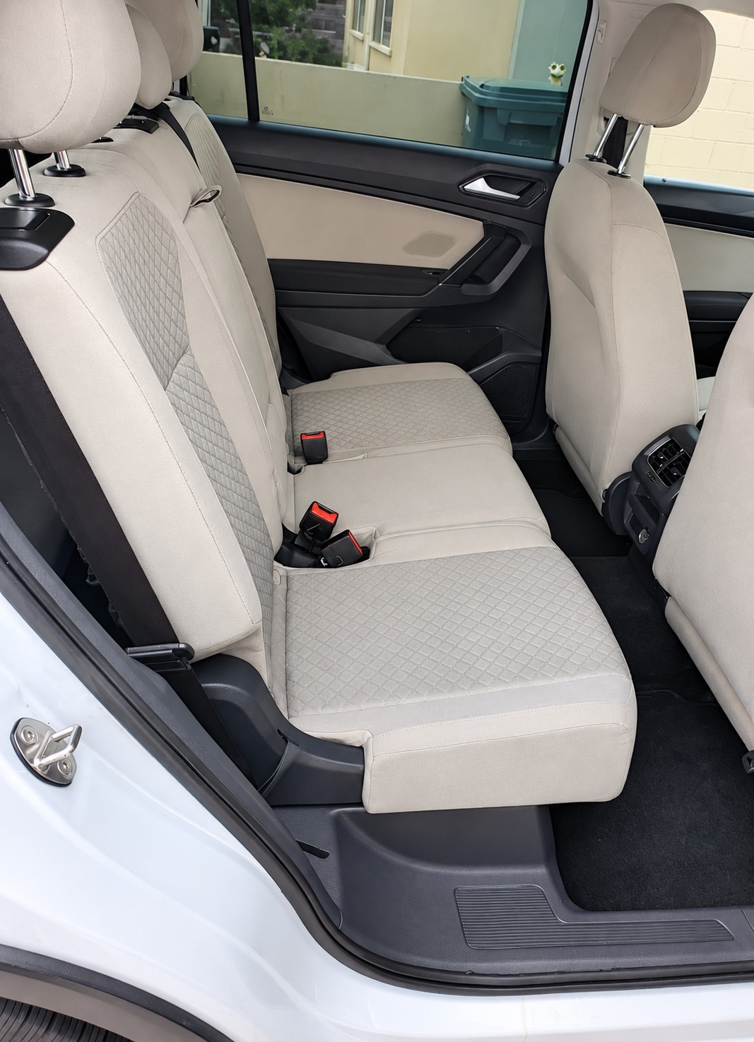 The same light cloth rear seating area cleaned, viewed from a different angle